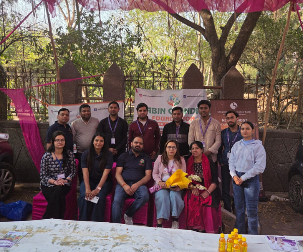 Nabin Chandra Foundation team and guests posing together in a park